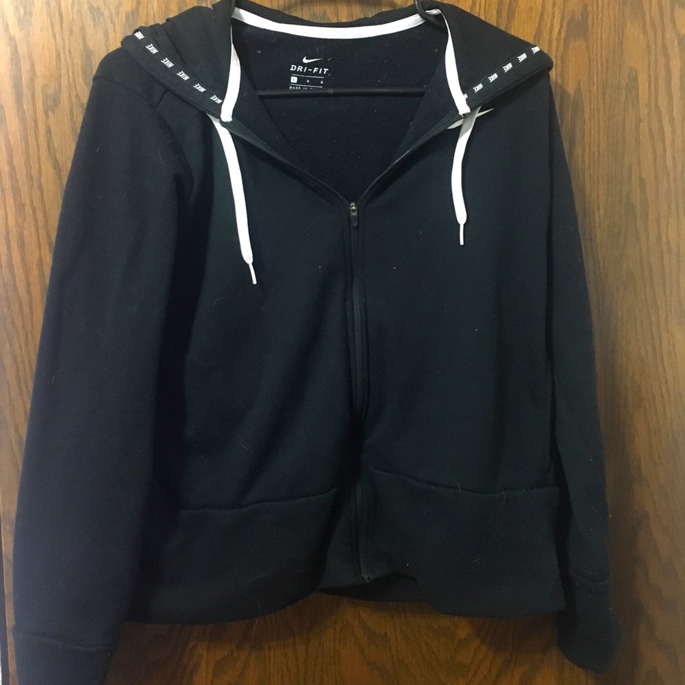 Black nike zip up hoodie.